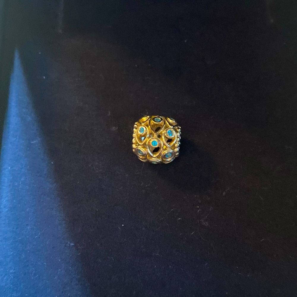 Pandora ocean treasures charm 14k with topaz very good condition.